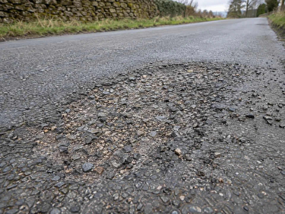 Illustrative example of fretting and loose aggregate on asphalt